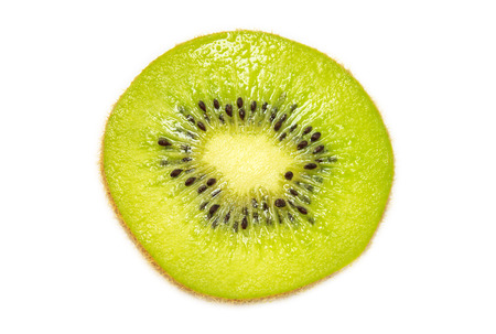 Cross section of ripe kiwi isolated on white backgroundの写真素材