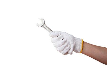 Mechanic hand hold spanner tool in handの写真素材