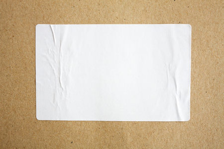 Stickers label on brown paper backgroundの写真素材