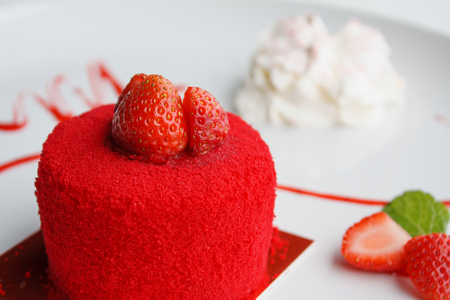 sweet strawberry cake on white plateの写真素材