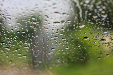 abstract natural rain water drops on glassの写真素材