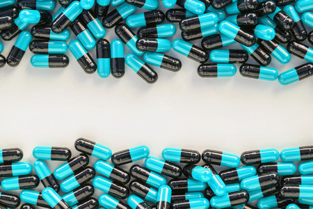 Many medicines pills capsules backgroundの写真素材