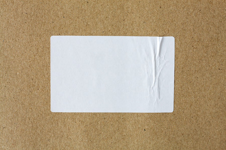 Stickers label on brown paper backgroundの写真素材