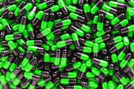 Many medicines pills capsules backgroundの写真素材