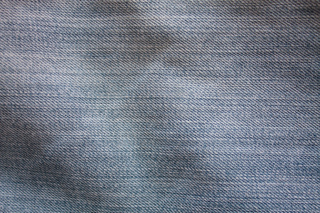 Texture of blue jeans textile close upの写真素材
