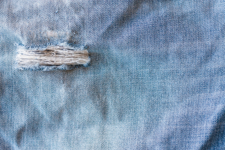 Jeans torn denim texture close upの写真素材