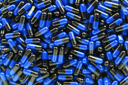 Many medicines pills capsules background