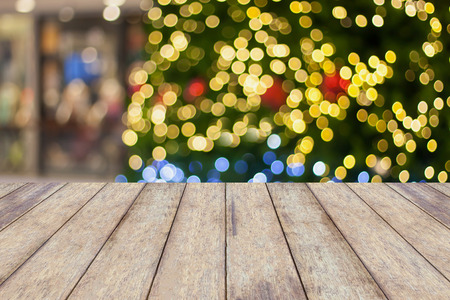 wood floor with decorations on the Christmas tree, Christmas blurred backgroundの写真素材