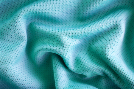 Sport clothing fabric texture background, top view of cloth textile surfaceの写真素材