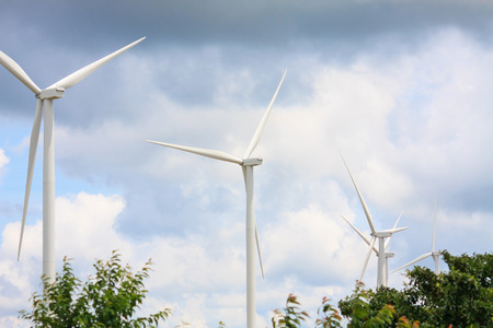 Wind turbines with the clouds and sky, renewable energyの写真素材