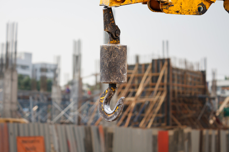 crane with construction site blurred backgroundの写真素材
