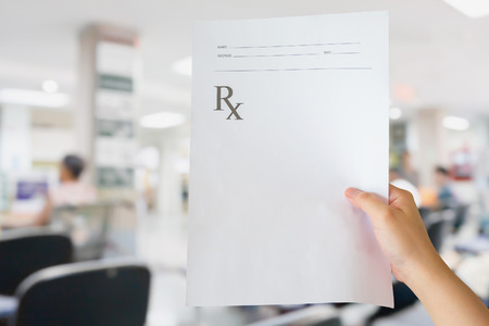 hand hold medical prescription at the hospitalの写真素材