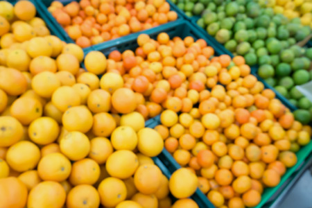 Fresh oranges in the market blur backgroundの写真素材