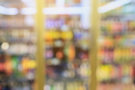 convenience store refrigerator shelves blurred backgroundの写真素材