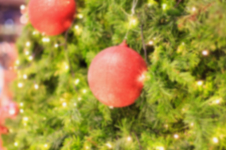 Decorated Christmas tree blurred backgroundの写真素材