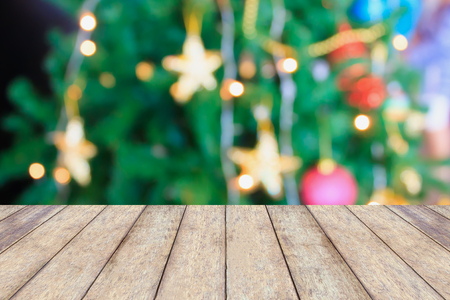 Christmas holiday background with empty rustic wood tableの写真素材