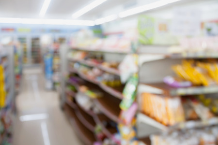 convenience store shelves blurred backgroundの写真素材