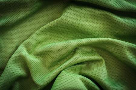 crumpled green fabric texture backgroundの写真素材