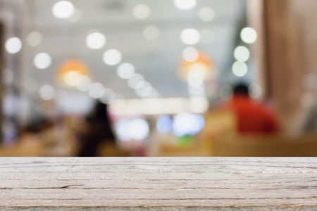 table top with blur cafe restaurantの写真素材