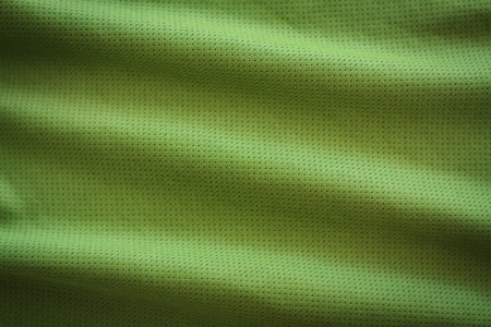 crumpled green fabric texture backgroundの写真素材