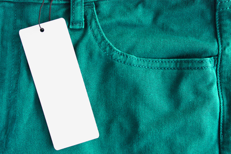 Jeans with blank paper price tagの写真素材