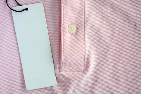 blank price tag on polo shirtの写真素材