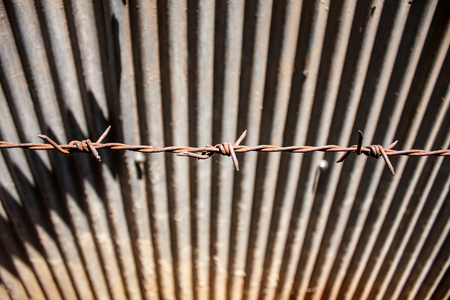 Rusty barbed wireの写真素材