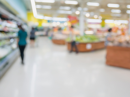 Grocery store blur background with customersの写真素材