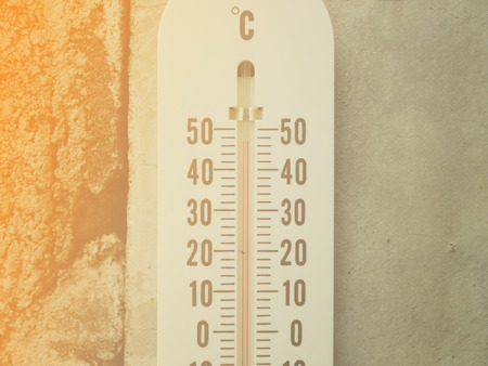 Closeup thermometer showing temperature in degrees Celsius, Hot temperatureの写真素材