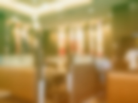 Blur coffee shop or cafe restaurant with abstract bokeh backgroundの写真素材