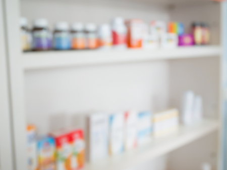 Close up of medicine bottles on shelves of drugs in the pharmacy, Pharmacy drugstore blurred backgroundの写真素材
