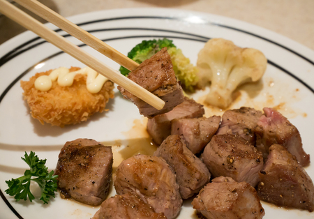 Grilled beef steak, beef steak japanese style food on white plateの写真素材