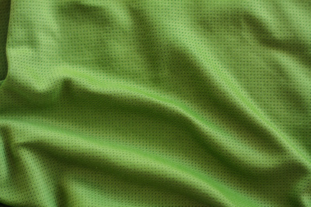 crumpled green fabric texture backgroundの写真素材