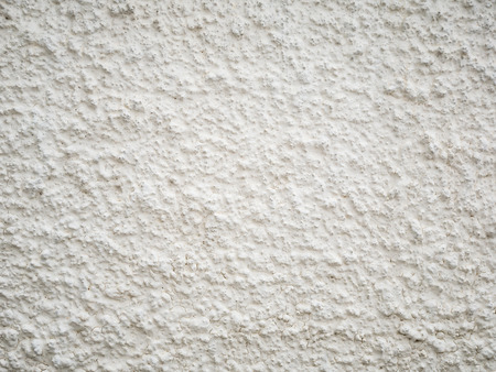 White rough cement wall texture backgroundの写真素材
