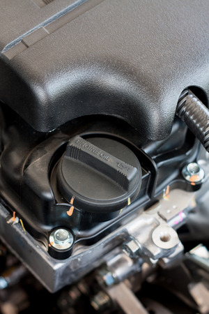 closeup engine oil cap in car engineの写真素材
