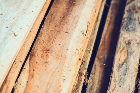 Large stack of wood planks, teak woodの写真素材