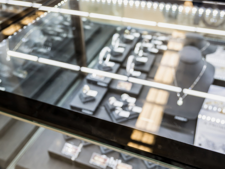 jewelry diamond store window display blurred background with bokeh lightの写真素材