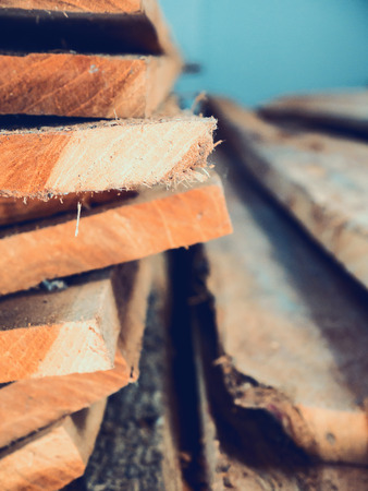 Stack of teak wood plank backgroundの写真素材