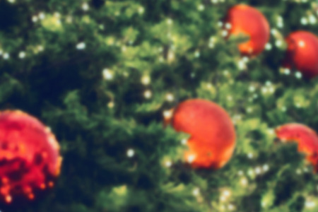 Decorated Christmas tree blurred backgroundの写真素材