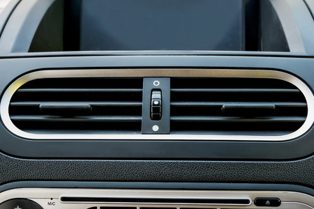 Air conditioner in modern car close up, car interior detailの写真素材