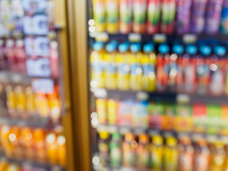 supermarket refrigerator shelves with drinks beverage productsの写真素材