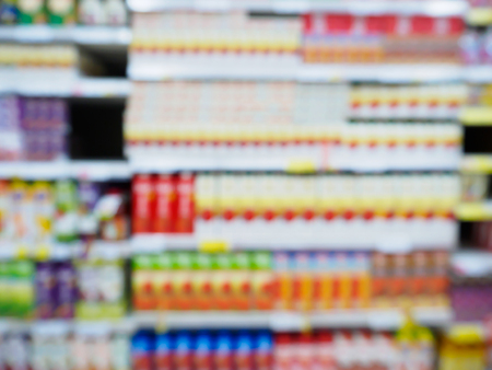 Supermarket shelves with abstract defocused blur backgroundの写真素材
