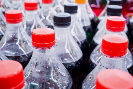 Carbonated soft drink bottles close upの写真素材