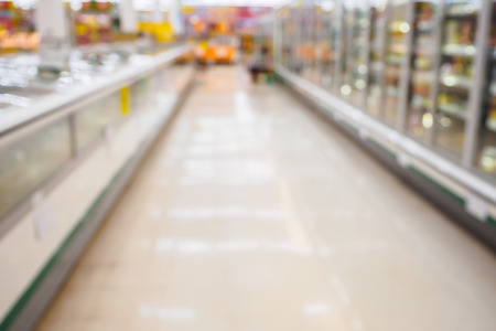 Supermarket with abstract defocused blur backgroundの写真素材