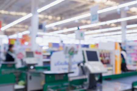 Blur cashier checkout counter in the supermarketの写真素材