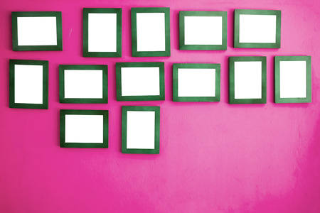 Photo frames on the colorful wallの写真素材