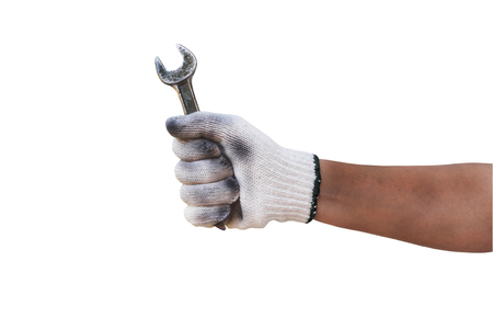 Mechanic hand hold wrench tool in hand isolated on whiteの写真素材