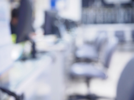 office blurred background with people working at deskの写真素材