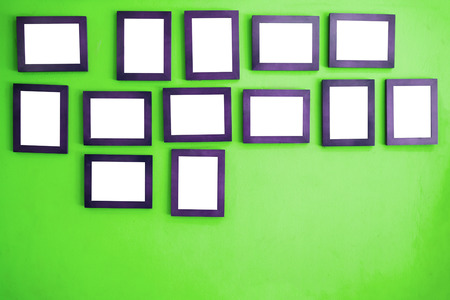 Photo frames on the colorful wallの写真素材