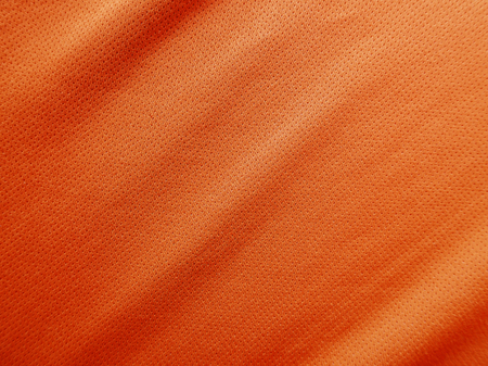orange sports clothing fabric jersey textureの写真素材